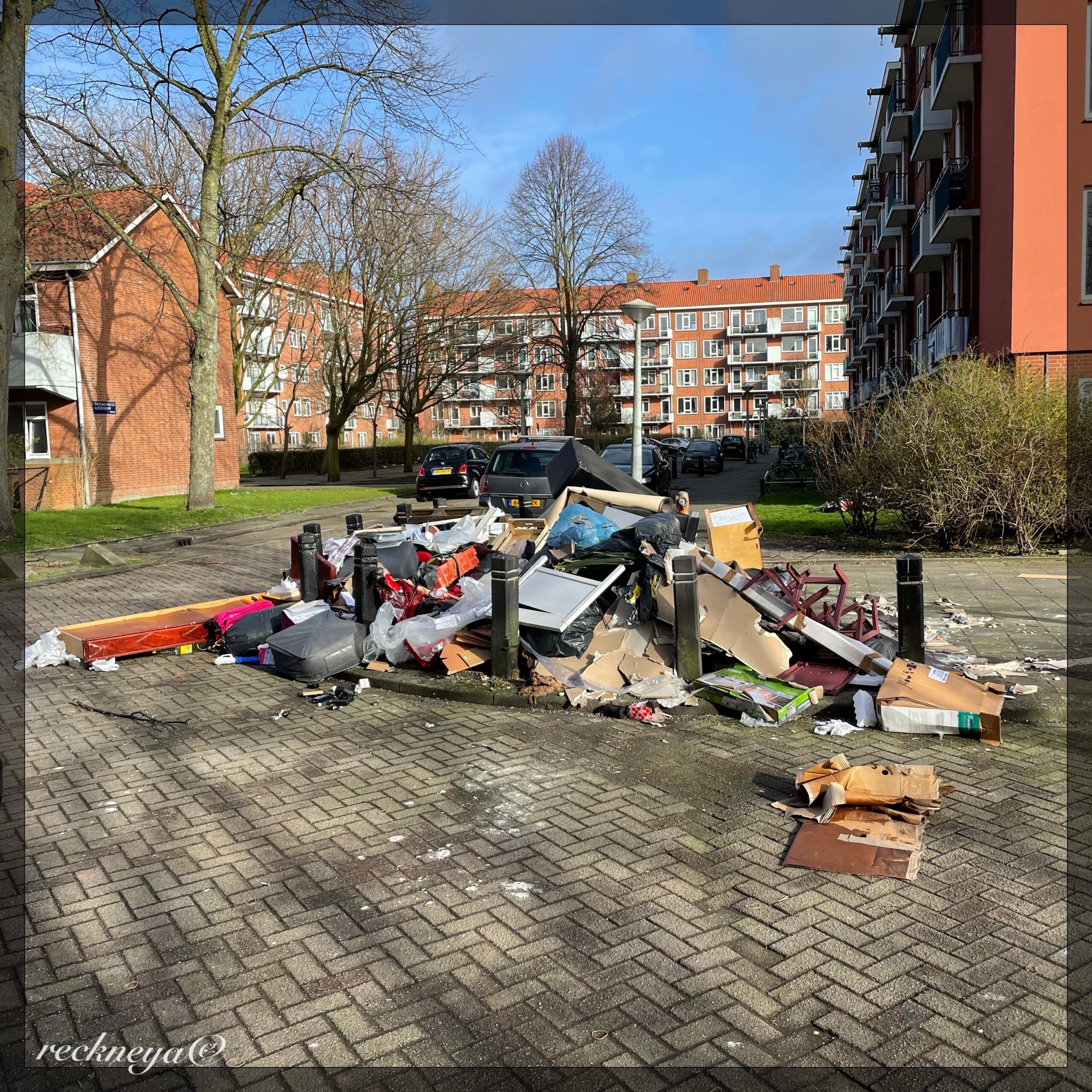This is a weekly garbage pile near my old work in Amsterdam. The level of societal decline in some neighbourhoods there has reached such lows that the people living there can no longer be arsed to bring their garbage to a bin or garbage disposal. They often just throw their trash from the balconies. This has evolved in a situation where the municipal government allows people to throw their bigger trash onto piles to be collected weekly. Whatever isn't scavenged away will be collected and brought to a sorting facility. Anything that can burn will be thrown into the incinerator, which turns the garbage into electricity and hot water, which is then sold again to the people. It is the opposite image of the green city Amsterdam pretend to be.